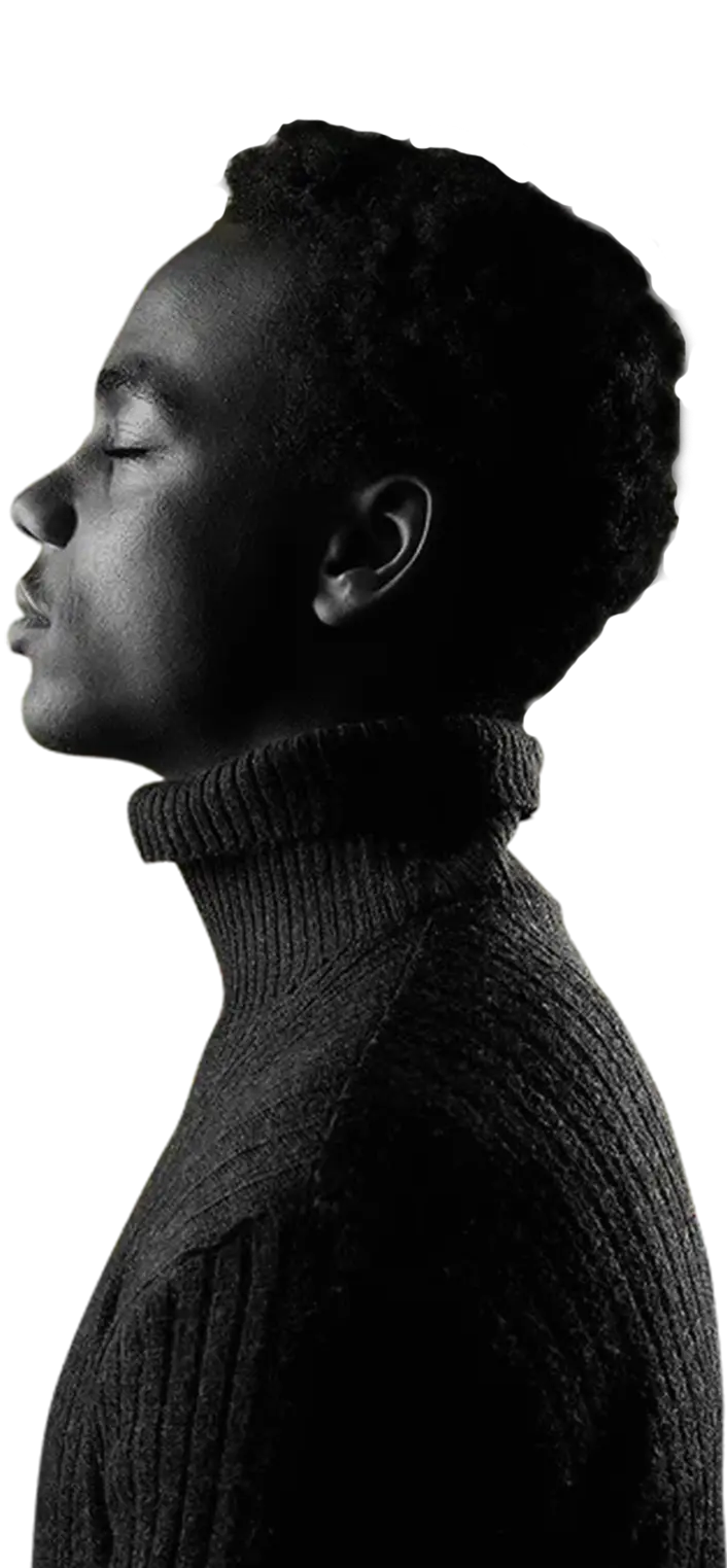 Portrait of a person in profile wearing a black turtleneck